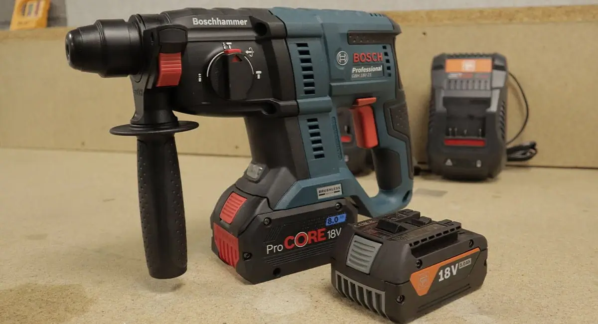 Bosch SDS Drill with old battery and new AMPShare battery