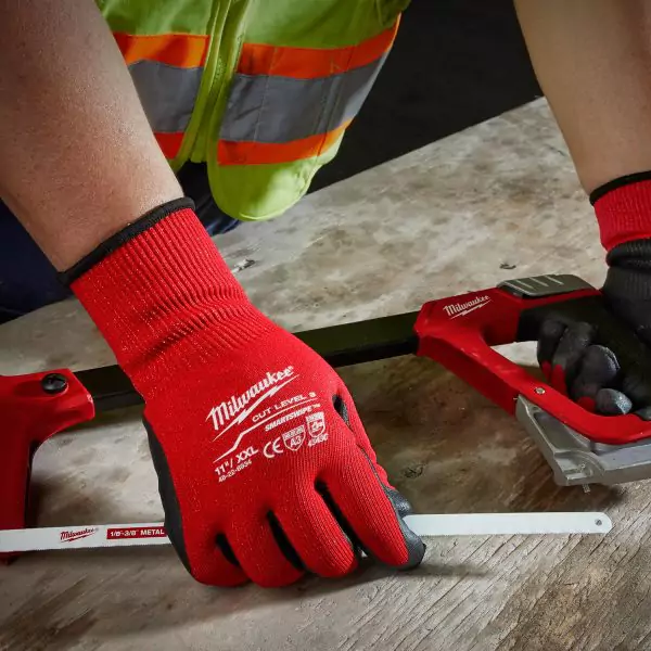 A construction worker wearing milwaukee nitrite gloves