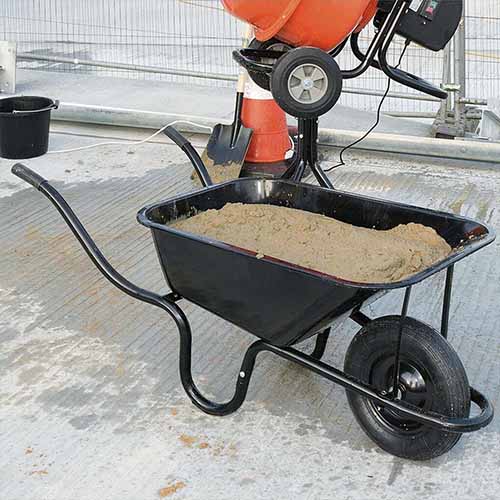 a wheelbarrow filled with cement